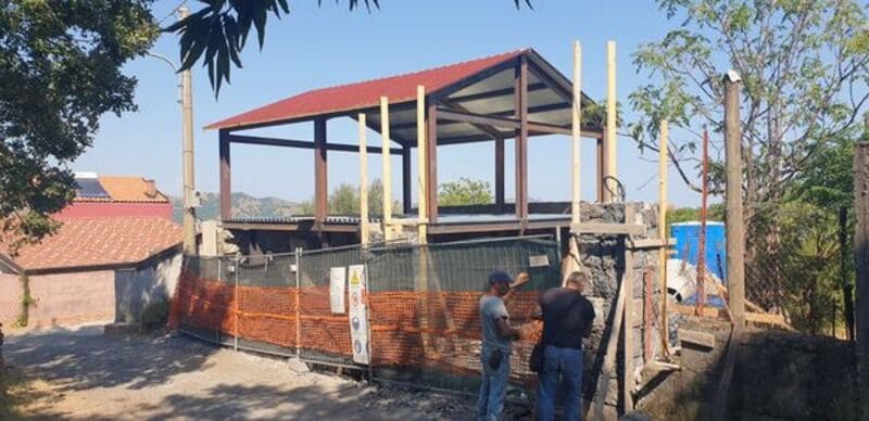 Construction site with two people